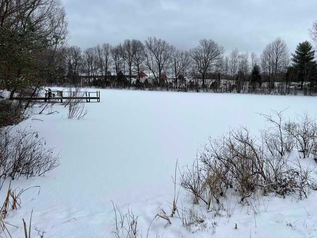 Snow covered frozen lake
